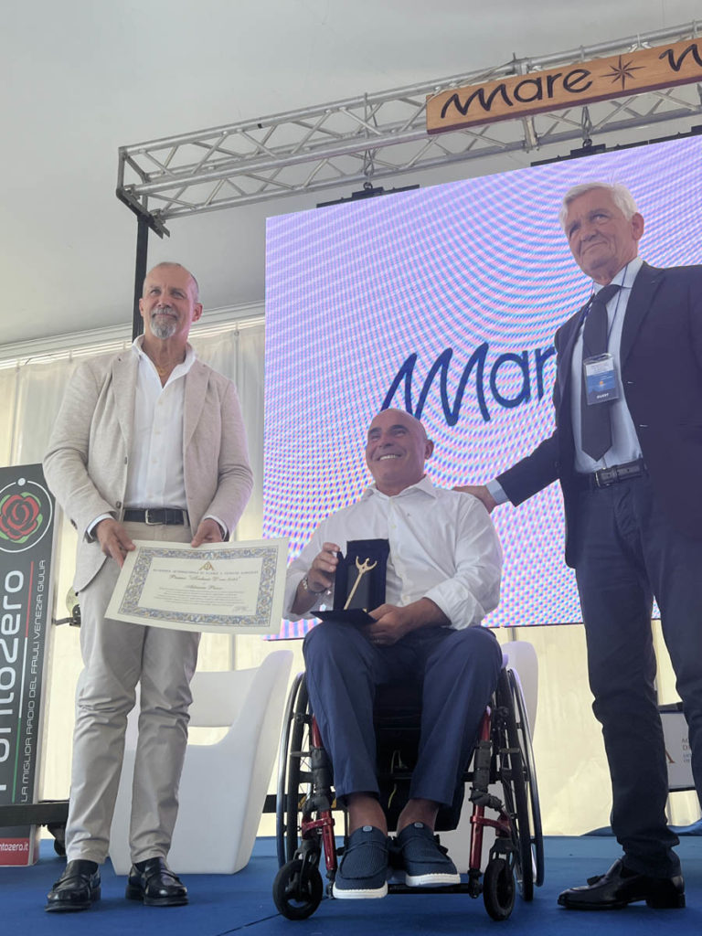 Conferimento del Tridente d’Oro 2024 ad Adriano Penco – Italia – Fotografo.